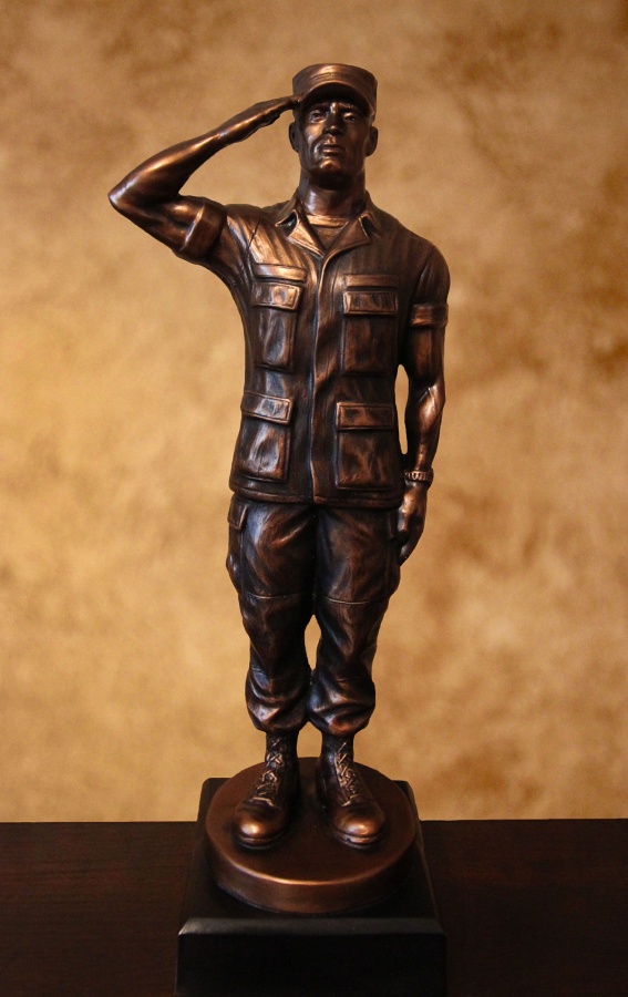 Saluting US Army Soldier with Cap