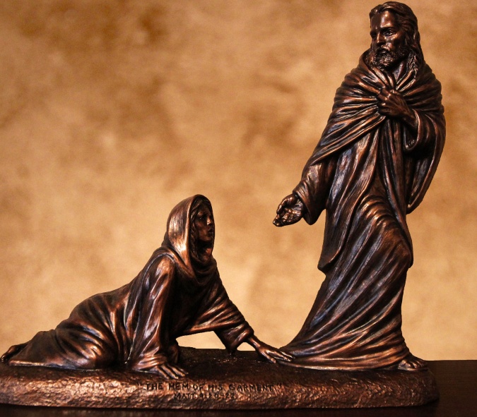 the hem of his garment christian sculpture