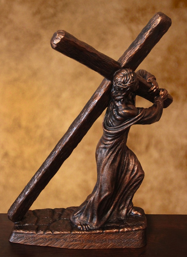 Via dolorosa sculpture of jesus carrying a cross