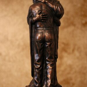 jesus embracing man sculpture