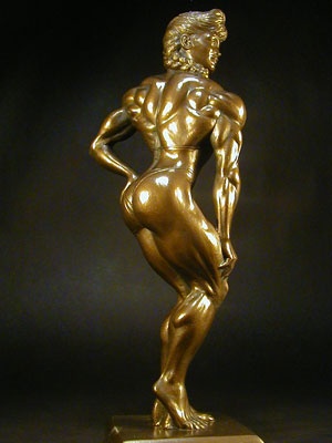 female twisting back bodybuilding trophy